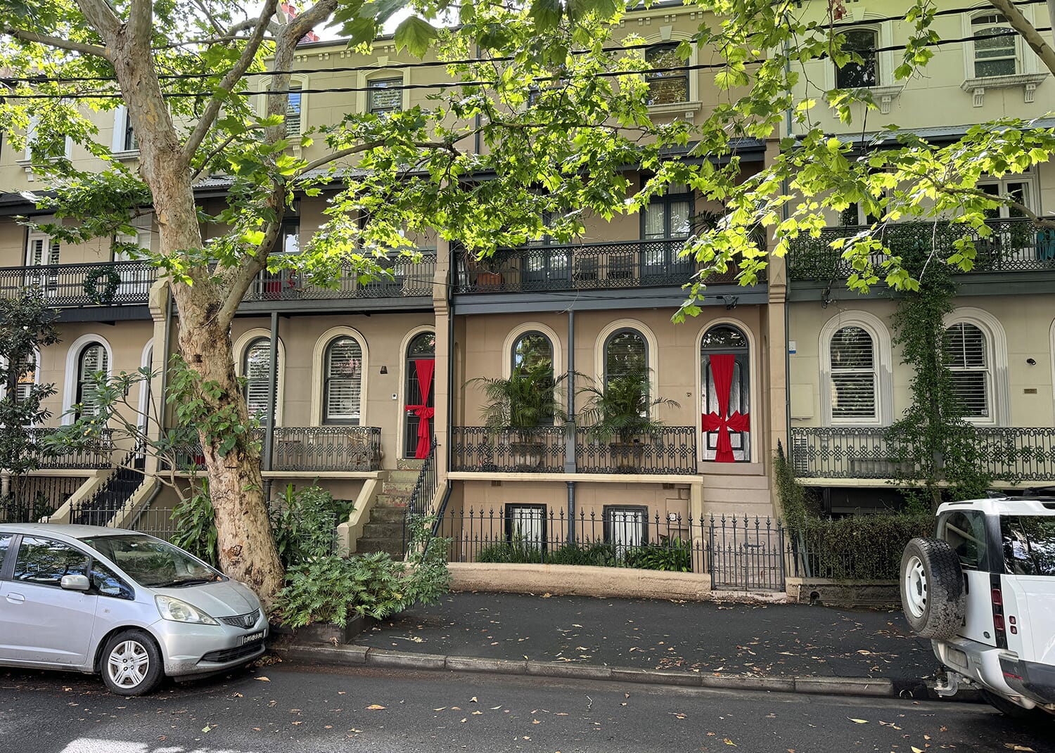 Pictured: A big red bow on a door at Bourke Street Surry Hills