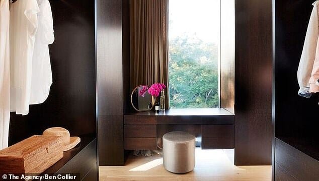 The master bedroom features a walk-in closest and bespoke finishes.