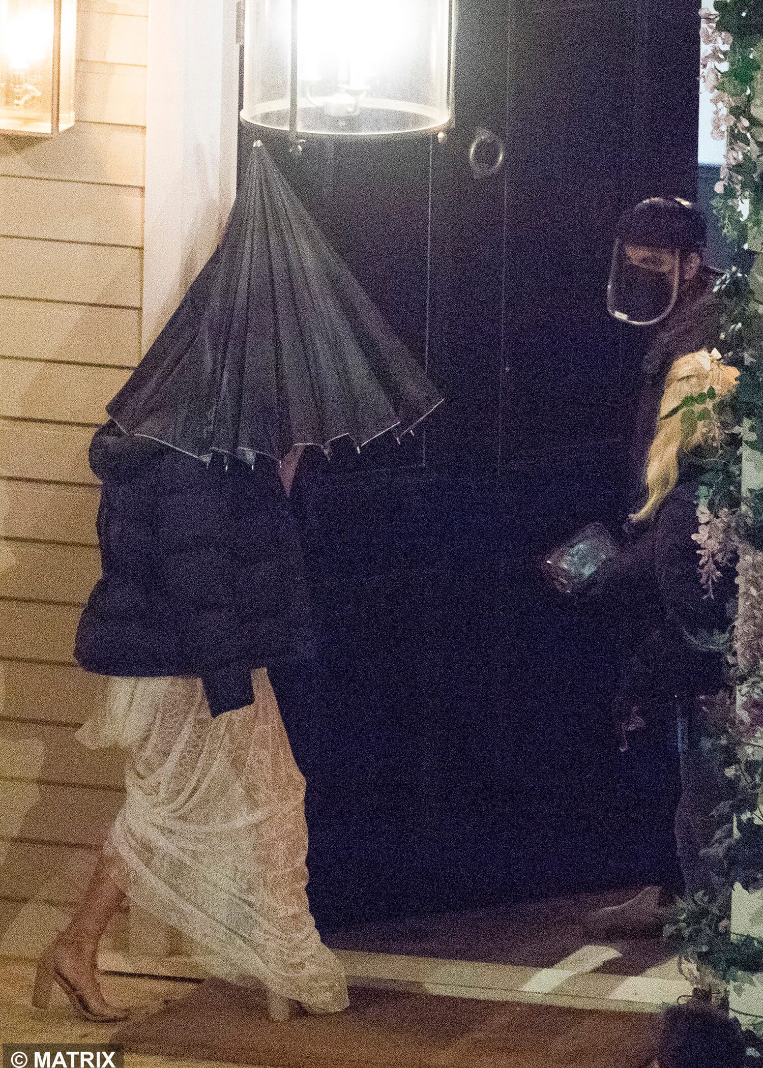Here's Bella hiding from the paps