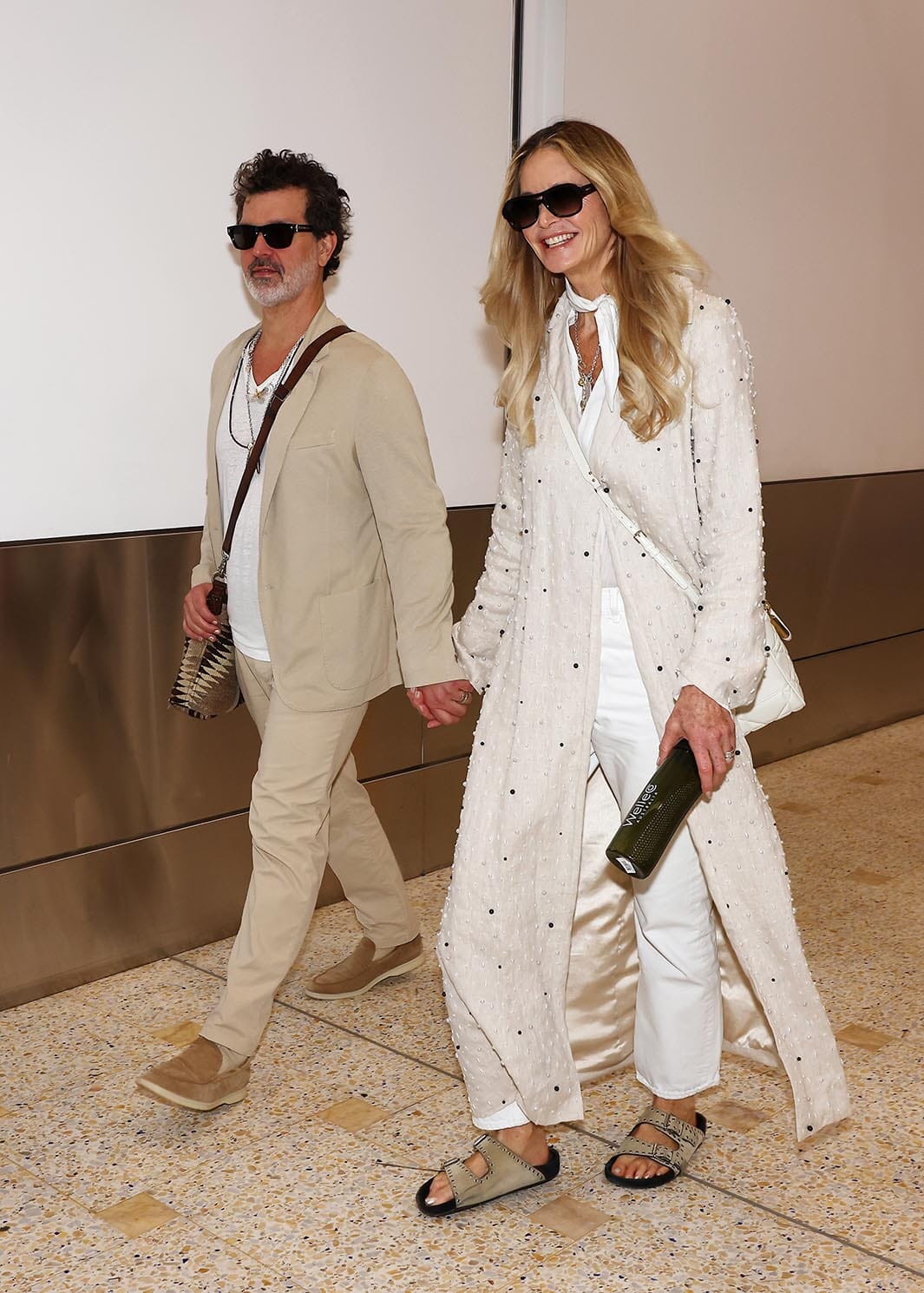 Pictured: Elle Macpherson arrives in Sydney with Doyle Bramhall