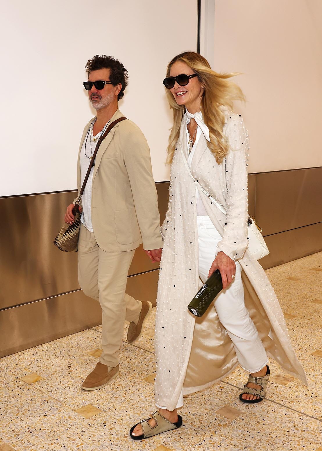 Pictured: Elle Macpherson arrives in Sydney with Doyle Bramhall