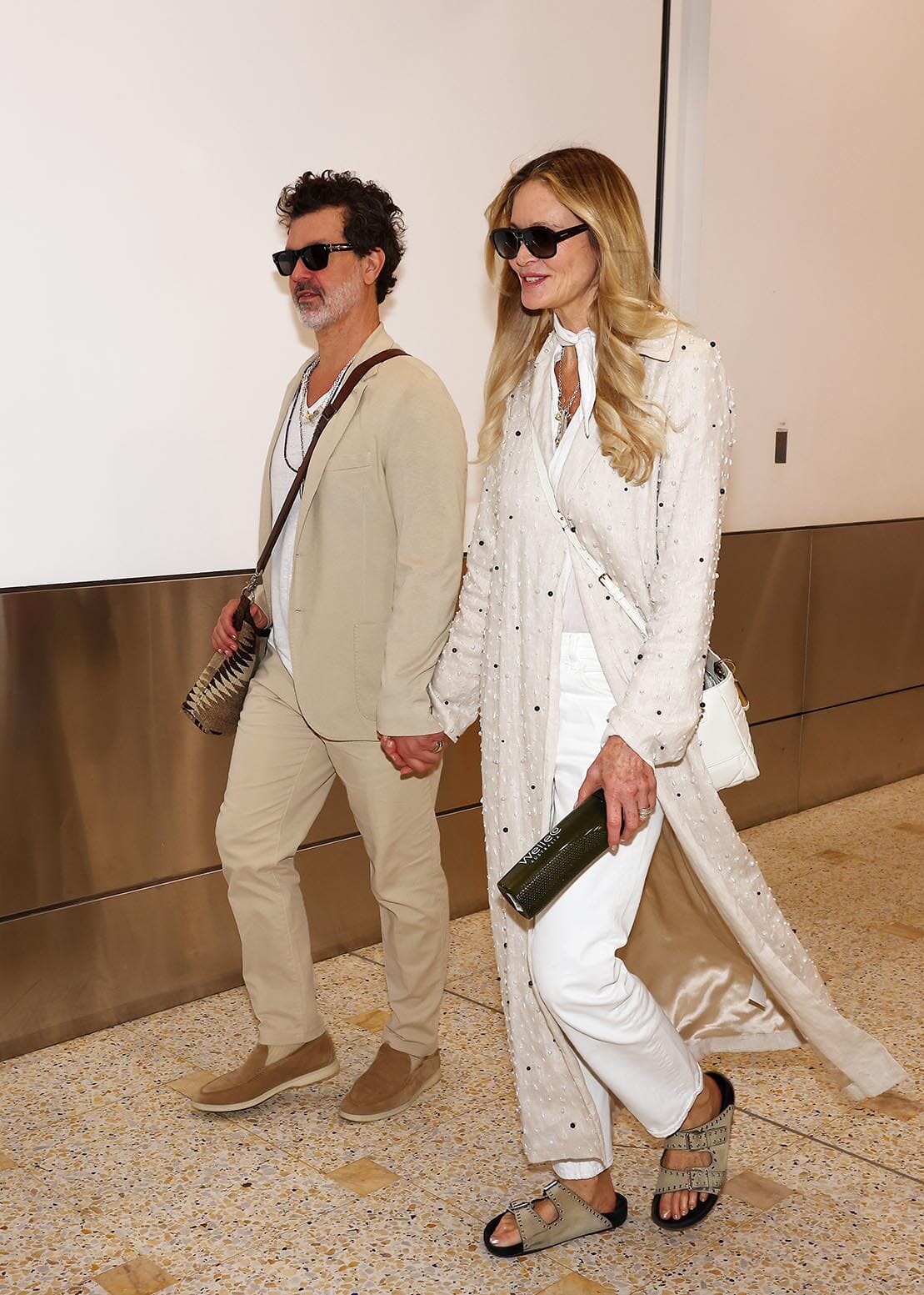 Pictured: Elle Macpherson arrives in Sydney with Doyle Bramhall