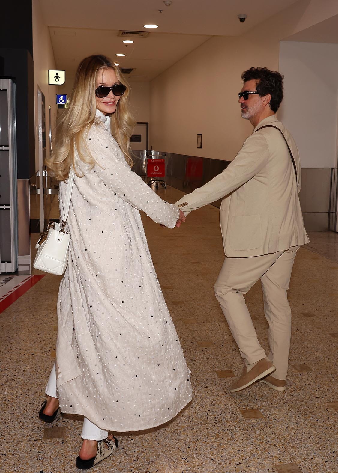 Pictured: Elle Macpherson arrives in Sydney with Doyle Bramhall