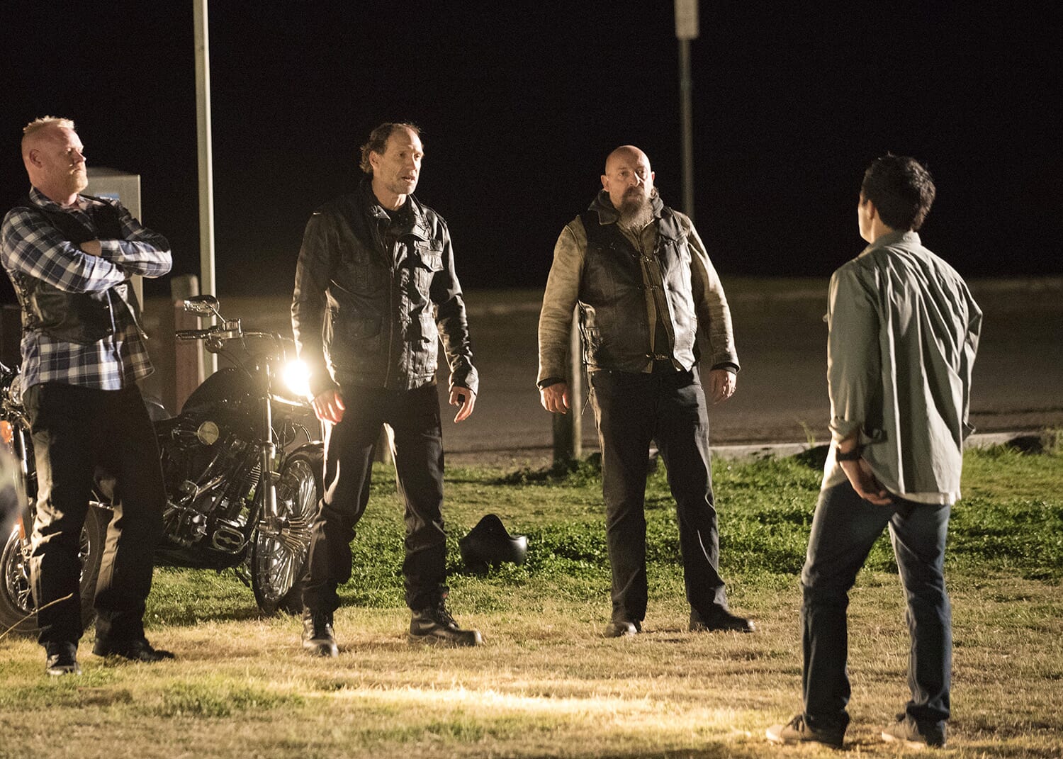 a man is confronted by bikies