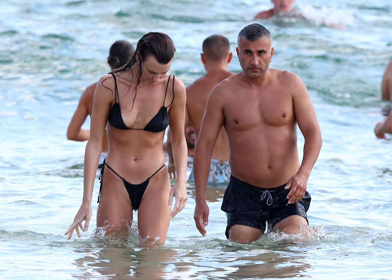 Pictured: Montana Cox & mystery man at Bondi Beach