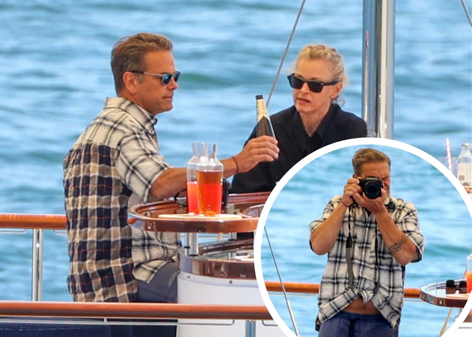 Lachlan Murdoch drinks a Crown Lager while cruising Sydney Harbour with his wife Sarah